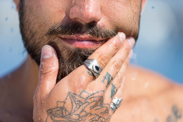 tattooed man with a beard