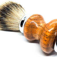 close up of a mesquite handle on a shave brush with a black badger knot