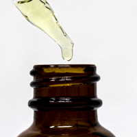 Bay Rum Beard Oil dropper with a drop of beard oil