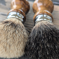 Silvertip and black badger shave brushes with black limba handle