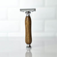 premium grooming razor mango hardwood handle standing upright on a white background