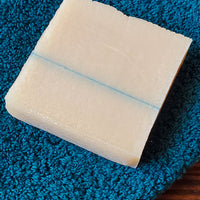 journeyman all in one shampoo bar for men on a towel