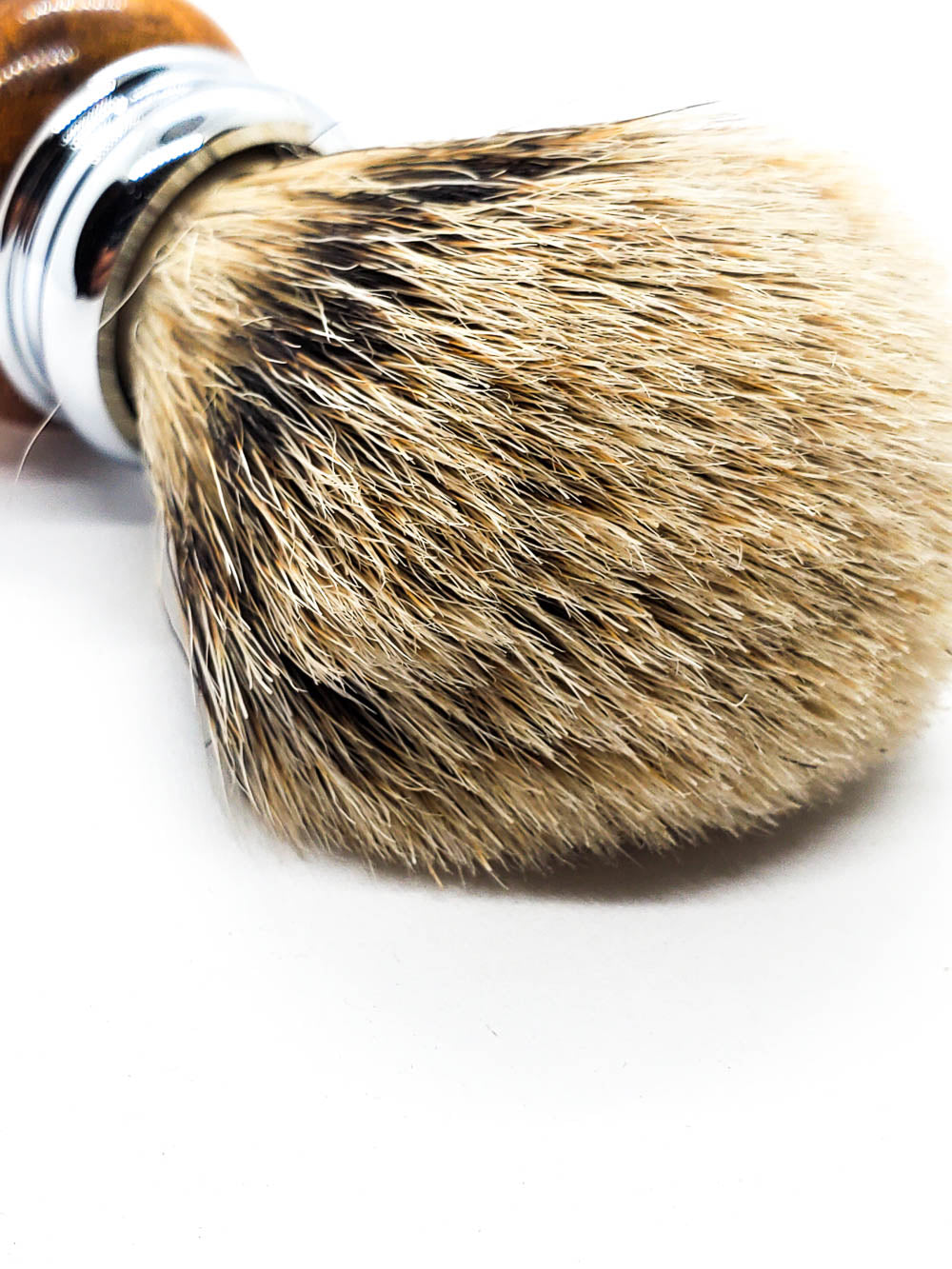 close up of a silvertip badger knot