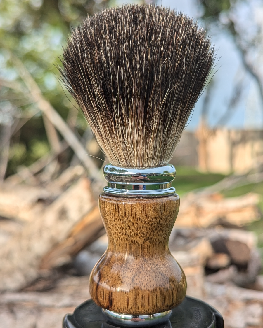 black badger shave brush with black limba handle outside