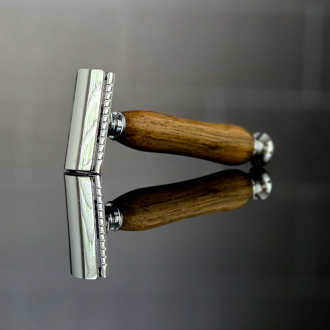 luxury wooden razor handle close up texture on a dark surface