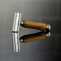 luxury wooden razor handle close up texture on a dark surface