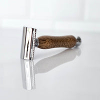 luxury wooden razor handle close up texture - side front view on a white background