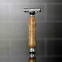 premium grooming razor mango hardwood handle standing upright