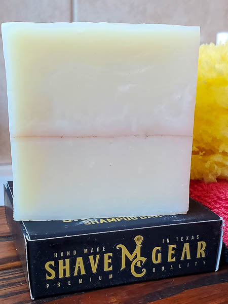 Sandalwood shampoo bar for men on a box with the mc shave gear logo. 
